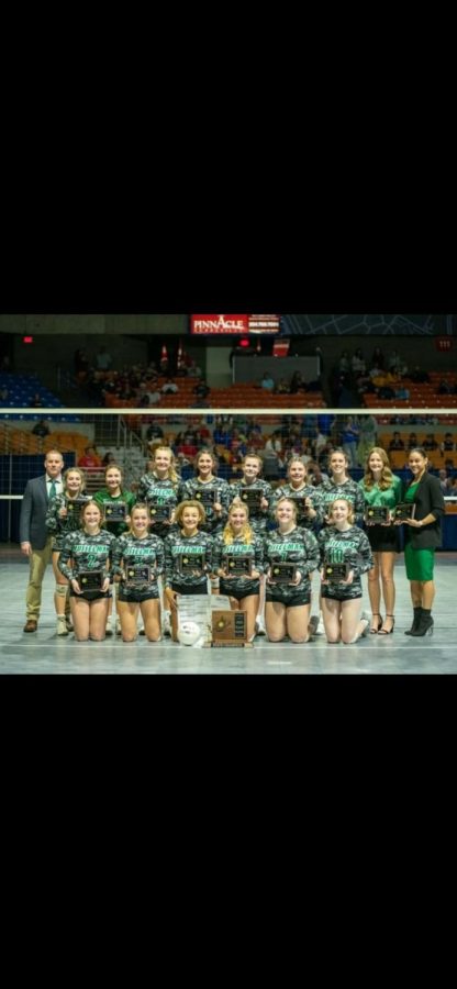 Pictured is the Musselman High Schools Varsity Volleyball team winning at states for the third year in a row. 