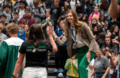 Pictured is MuHS head principal, Mrs. Riggleman giving a high five to seniors at last years Step Up Day. 
Picture by Musselman High FB.