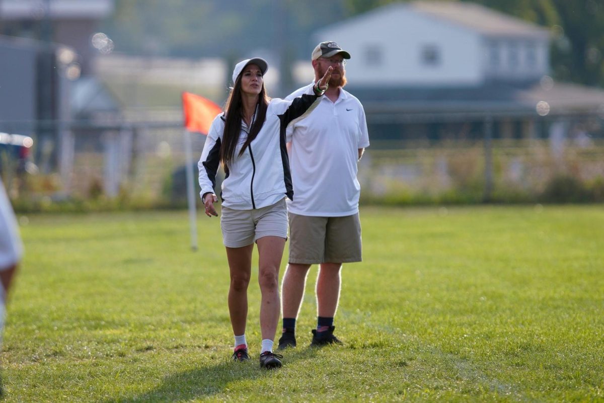 Pictured above is Mrs. Amber Smith, left, the Lady Applemen head soccer coach.